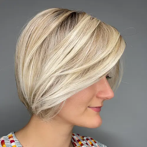 STRAIGHT UP WITH A TWIST WIG BY RAQUEL WELCH