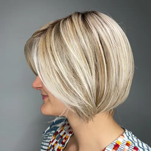 STRAIGHT UP WITH A TWIST WIG BY RAQUEL WELCH