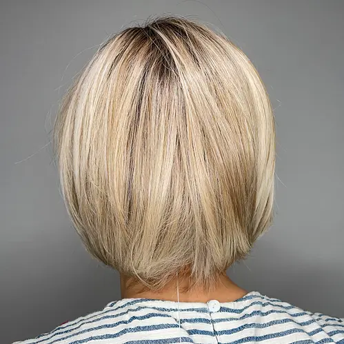 STRAIGHT UP WITH A TWIST WIG BY RAQUEL WELCH